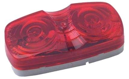 Picture of 12-volt surface mount red lens, single wire light. 4" x 2"